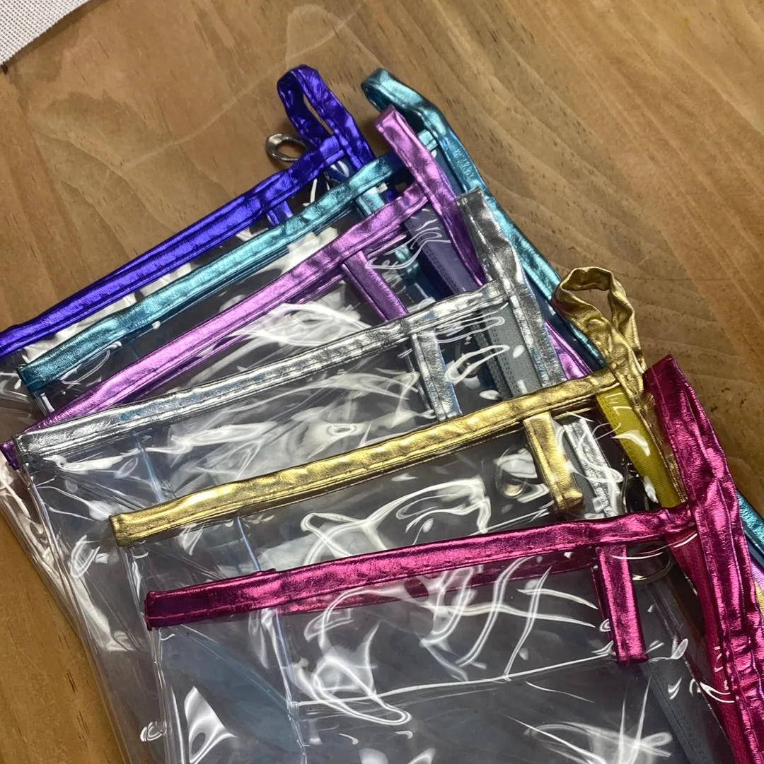 Clear bags with soft metallic trim