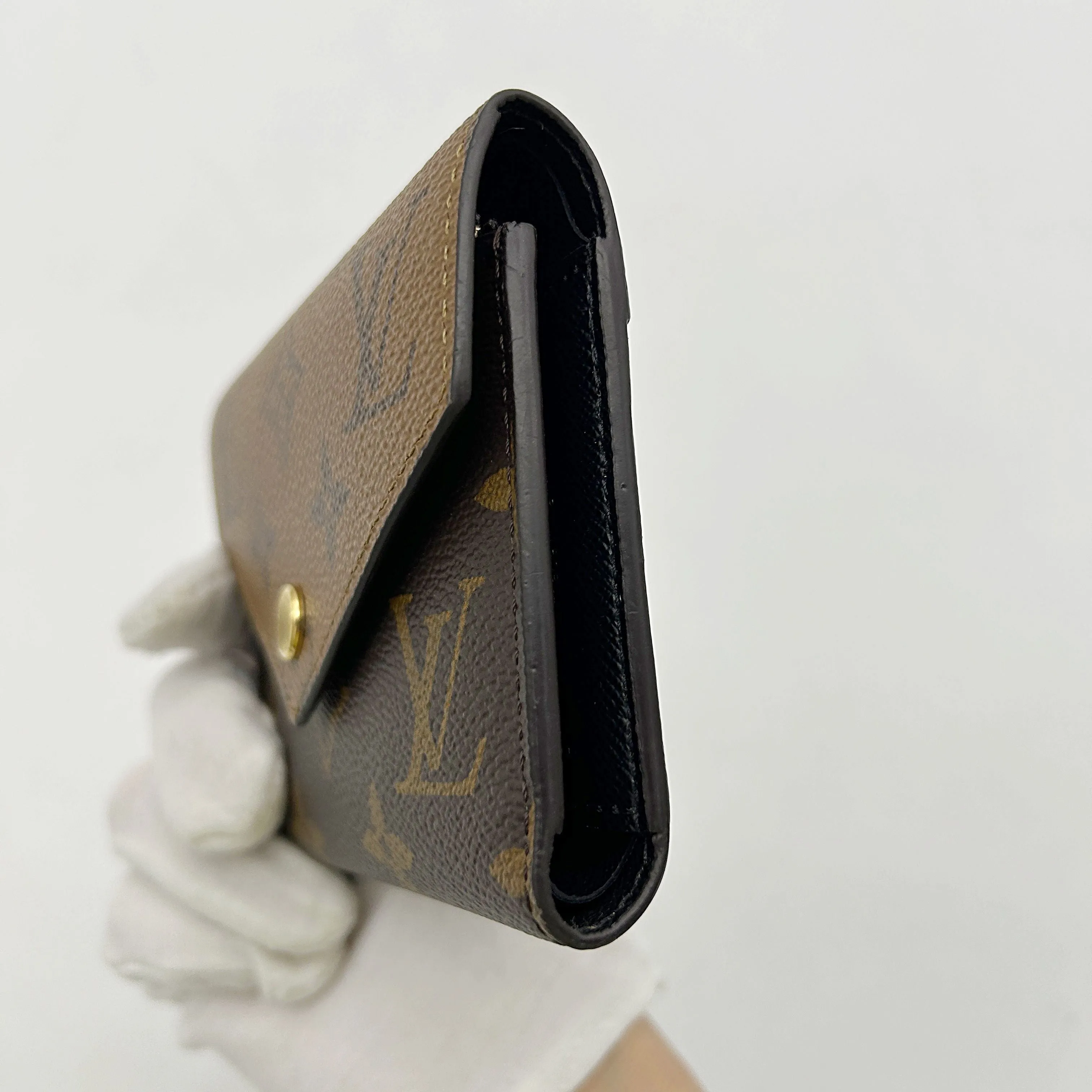 LOUIS VUITTON Reverse Monogram Victorine Wallet B0401A72KR