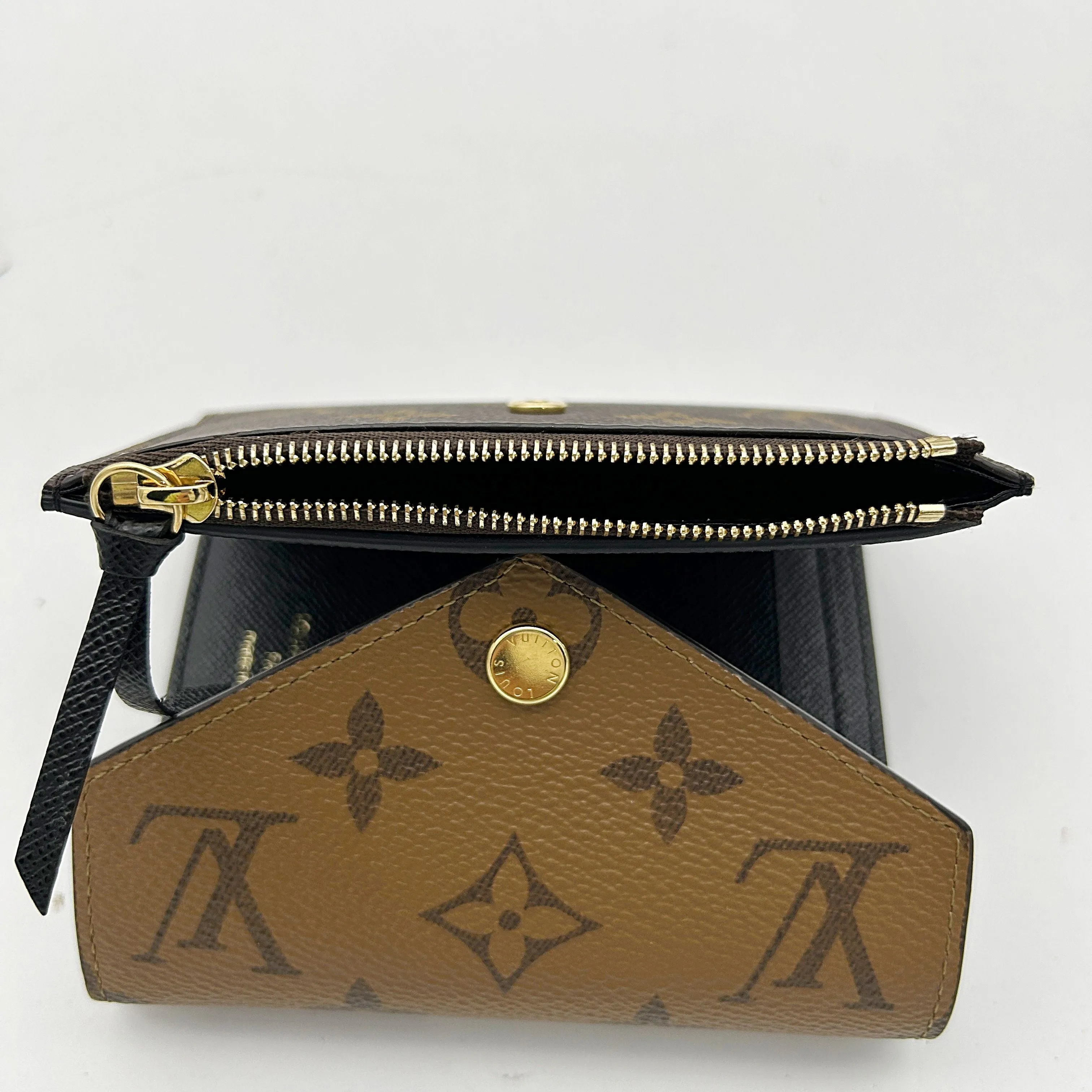 LOUIS VUITTON Reverse Monogram Victorine Wallet B0401A72KR