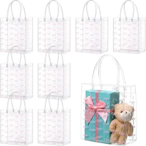 Sweetude 24 Pcs Coquette Bow Gift Bags Bow PVC Clear Gift Bag with Handle Goodie Candy Treat Bags for Birthday Baby Shower Bridal Shower Christmas Party Supplies
